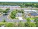Aerial shot showcasing the property and its surroundings in a neighborhood setting at 5163 Spanish Oaks Dr, Lakeland, FL 33805
