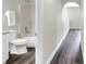 Bright bathroom featuring a tub with shower, white fixtures, and modern vanity at 5163 Spanish Oaks Dr, Lakeland, FL 33805