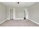 Bedroom featuring carpet flooring, ceiling fan and neutral paint at 5163 Spanish Oaks Dr, Lakeland, FL 33805