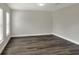 Bright, open room with modern flooring, large windows and fresh paint at 5163 Spanish Oaks Dr, Lakeland, FL 33805
