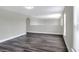 Living Room with hardwood flooring and an arched entry at 5163 Spanish Oaks Dr, Lakeland, FL 33805