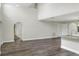Spacious living room has vaulted ceilings and modern archways at 5163 Spanish Oaks Dr, Lakeland, FL 33805