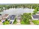 Aerial view of home and lush landscaping with amazing water views at 601 Peninsular Dr, Lakeland, FL 33813