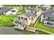 Aerial view of the home, back yard, multi-level decks, and waterfront location at 601 Peninsular Dr, Lakeland, FL 33813