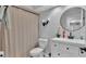 Cozy bathroom features a shower and vanity with storage at 601 Peninsular Dr, Lakeland, FL 33813