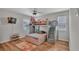 Comfortable bedroom features a bunk bed, ceiling fan, and hardwood flooring at 601 Peninsular Dr, Lakeland, FL 33813