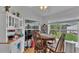 Breakfast nook with a round wooden table and views of the backyard at 601 Peninsular Dr, Lakeland, FL 33813