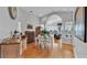 Bright open-concept dining room with beautiful archways and hardwood floors at 601 Peninsular Dr, Lakeland, FL 33813