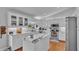 A well-lit kitchen equipped with a stainless steel microwave and an island with a marble top at 601 Peninsular Dr, Lakeland, FL 33813