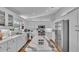 Bright kitchen with an island, stainless steel appliances, and white cabinetry for storage at 601 Peninsular Dr, Lakeland, FL 33813