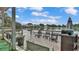 Lakeside deck with patio furniture and scenic waterfront views at 601 Peninsular Dr, Lakeland, FL 33813