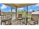 Relaxing screened porch with comfortable seating and a picturesque view of the lake at 601 Peninsular Dr, Lakeland, FL 33813