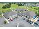 Aerial view of the clubhouse, driving range and putting green at 6065 Magpie Dr, Lakeland, FL 33809