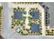 Aerial view of multiple outdoor pavilions with patio seating, adorned with beautiful landscaping at 6065 Magpie Dr, Lakeland, FL 33809
