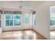 Bright bedroom with natural light, laminate flooring, and backyard access at 6065 Magpie Dr, Lakeland, FL 33809