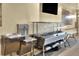 Functional buffet area with stainless steel serving stations, water fountain, and ample space at 6065 Magpie Dr, Lakeland, FL 33809
