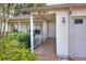 Front entrance showing address and protected entryway at 6065 Magpie Dr, Lakeland, FL 33809