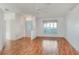 Bright living room with laminate flooring and a ceiling fan at 6065 Magpie Dr, Lakeland, FL 33809