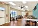 Comfortable community room with tables, chairs, natural light, and views at 6065 Magpie Dr, Lakeland, FL 33809