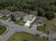 An aerial view of a home with well-maintained landscaping and a charming exterior at 6250 Silver Leaf Ln, Lakeland, FL 33813