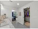 Bright bathroom with granite counters, access to bedroom and walk-in closet at 6250 Silver Leaf Ln, Lakeland, FL 33813