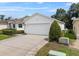 Pleasant single-story home with a two-car garage, neat landscaping, and a well-maintained yard at 6250 Silver Leaf Ln, Lakeland, FL 33813
