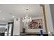 Kitchen highlighting a sparkling chandelier, stainless steel appliances, and granite countertops at 6250 Silver Leaf Ln, Lakeland, FL 33813