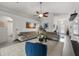 Spacious living room with vaulted ceilings, recessed lighting, and stylish sectional sofa at 6250 Silver Leaf Ln, Lakeland, FL 33813