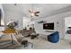 Bright living room with vaulted ceilings, recessed lighting, and contemporary furniture at 6250 Silver Leaf Ln, Lakeland, FL 33813