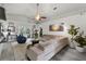 Open-concept living room boasting vaulted ceilings, recessed lighting, and modern decor at 6250 Silver Leaf Ln, Lakeland, FL 33813