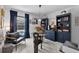 Modern office with pool view, built-in shelving, and unique lighting at 6250 Silver Leaf Ln, Lakeland, FL 33813