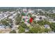 Aerial view of a home with mature trees, conveniently located near city amenities and local attractions at 645 E Church St, Bartow, FL 33830