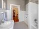 Bathroom with a vintage sink and updated shower and tub at 645 E Church St, Bartow, FL 33830