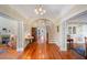 Inviting foyer featuring hardwood floors, archways, and natural light at 645 E Church St, Bartow, FL 33830