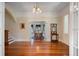 Inviting foyer features hardwood floors, neutral walls, and views into adjoining rooms at 645 E Church St, Bartow, FL 33830