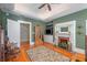 Inviting living room features hardwood floors, a decorative fireplace, and classic architectural details at 645 E Church St, Bartow, FL 33830