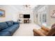 Comfortable living room with neutral tones and tiled floors at 645 E Church St, Bartow, FL 33830