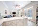 Living room area with kitchen access at 645 E Church St, Bartow, FL 33830