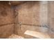 Luxurious tiled shower featuring dual shower heads, a built-in bench, and elegant mosaic accents at 645 E Church St, Bartow, FL 33830