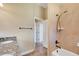 Bathroom featuring granite counters, walk-in shower, and modern fixtures at 6527 Eagle Ridge Way, Lakeland, FL 33813