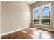 Bright bedroom with hardwood floors, large windows, and natural light at 6527 Eagle Ridge Way, Lakeland, FL 33813