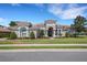 Stunning single-story home with a beautifully landscaped front yard and barrel tile roof at 6527 Eagle Ridge Way, Lakeland, FL 33813