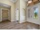 Welcoming foyer with tile flooring, high ceilings, and elegant double front doors at 6527 Eagle Ridge Way, Lakeland, FL 33813