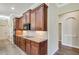 Modern kitchen with granite countertops, stainless steel appliances, and tiled backsplash at 6527 Eagle Ridge Way, Lakeland, FL 33813