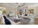 Bright living room features comfortable seating, and seamless access to dining at 6527 Eagle Ridge Way, Lakeland, FL 33813