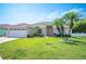 Charming one-story home with well-maintained lawn and two-car garage at 7016 Summit Cir, Winter Haven, FL 33884