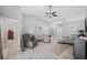Inviting living room featuring high ceilings, neutral decor, and plenty of natural light at 7016 Summit Cir, Winter Haven, FL 33884