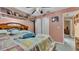 Comfortable bedroom with a spacious closet and light pink walls at 7311 Briarbay Loop, Lakeland, FL 33810
