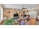 Comfortable living room boasts a vaulted ceiling, lots of decor and an open layout with a view of other living spaces at 7311 Briarbay Loop, Lakeland, FL 33810