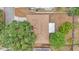 Aerial view of a well-maintained roof on a single-Gathering home with mature trees and a detached garage at 7311 Briarbay Loop, Lakeland, FL 33810